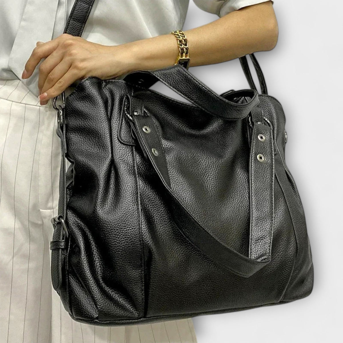 Olivia - Elegant skuldertaske i hobo-stil